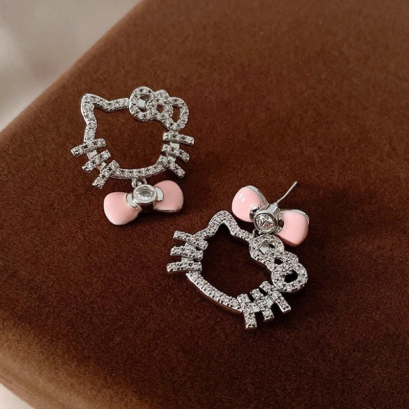 Angled view of the 14K Gold-Plated Elegant Zircon  Bow Kitten Earrings