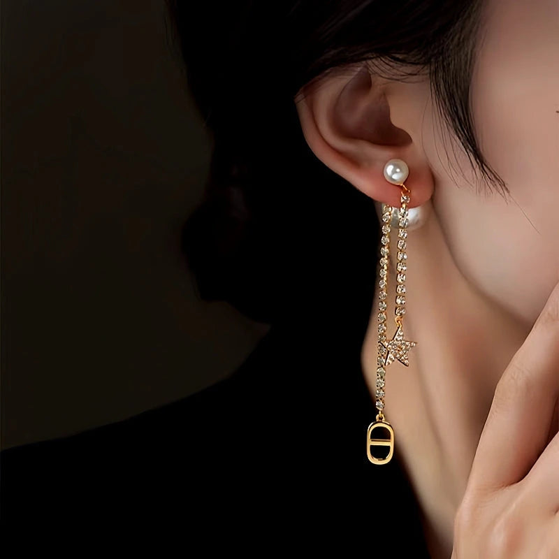 Close-up detail of the sparkling zircons and plating on the Star Pearl Jacket Earrings