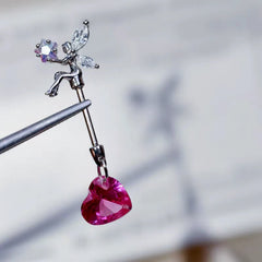 Close-up detail of the sparkling zircons and plating on the Elf Heart Earrings