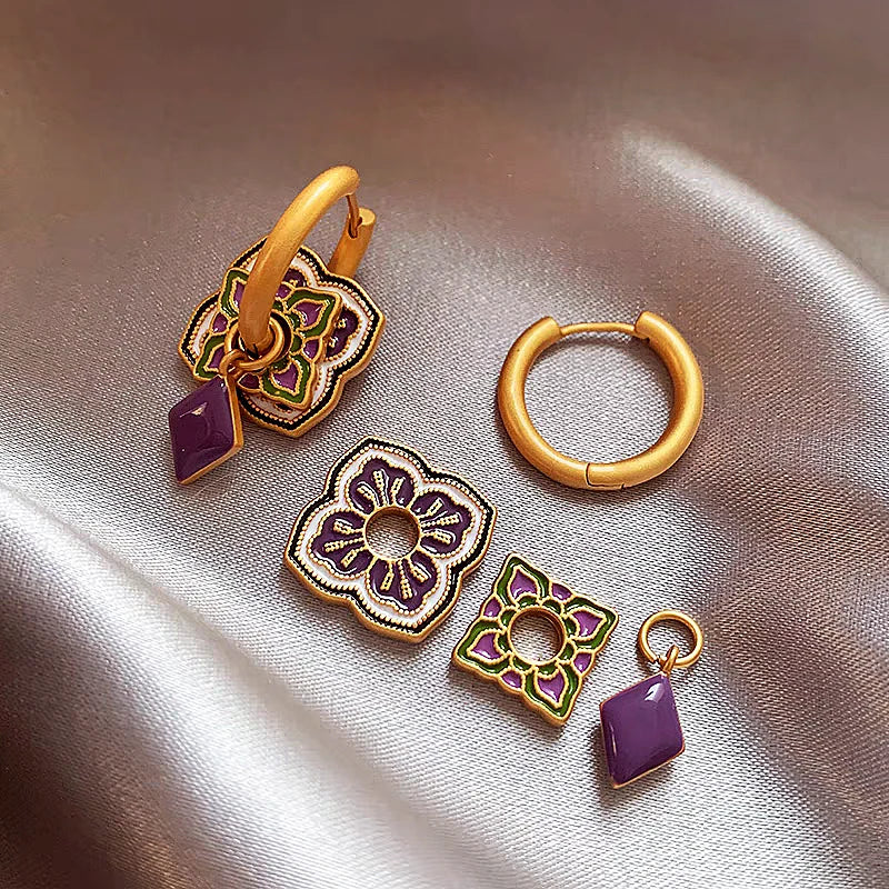 Close-up detail of the sparkling zircons and plating on the Purple Drip Earrings
