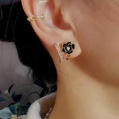 Close-up detail of the sparkling zircons and plating on the Black Camellia Studs