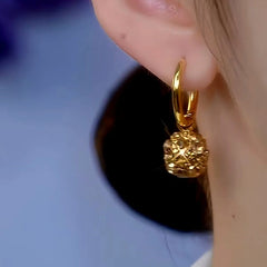 Close-up detail of the sparkling zircons and plating on the Diamond Ball Earrings