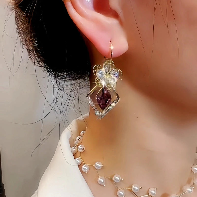 Close-up detail of the sparkling zircons and plating on the Flower Crystal Earrings