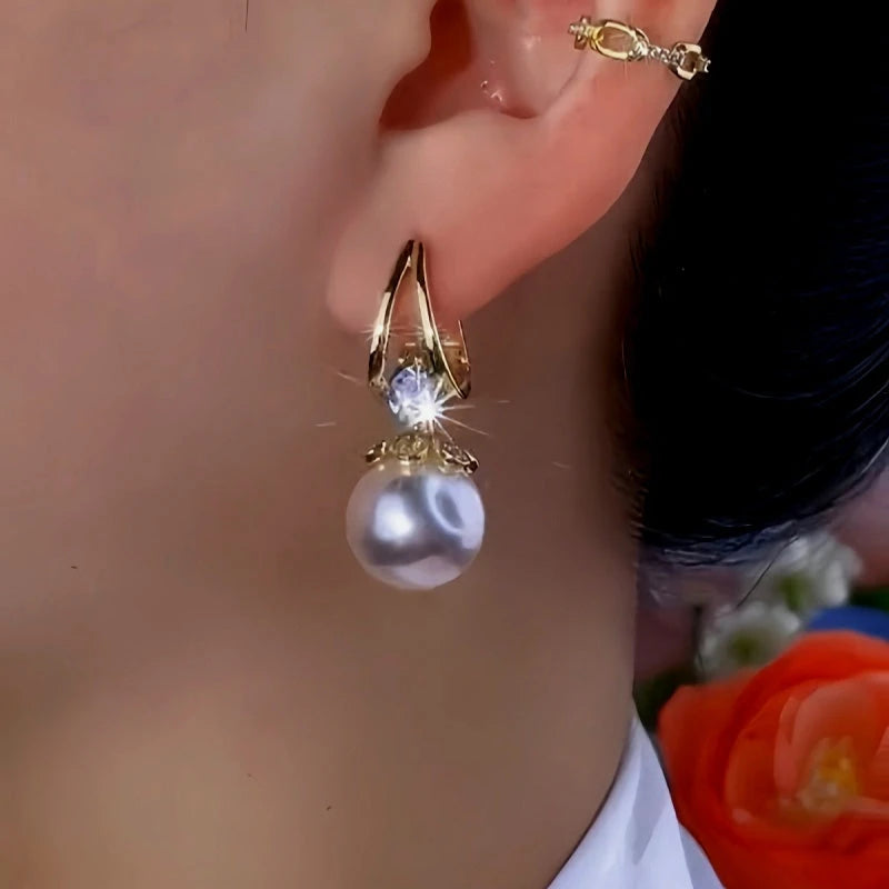 Close-up detail of the sparkling zircons and plating on the Exquisite Pearl Earrings