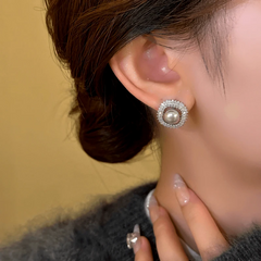 Angled view of the 14K Gold-Plated Exquisite Smoky Gray Square Bead Stud Earrings