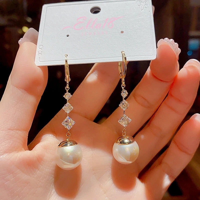 Close-up detail of the sparkling zircons and plating on the Pearl Tassel Earrings