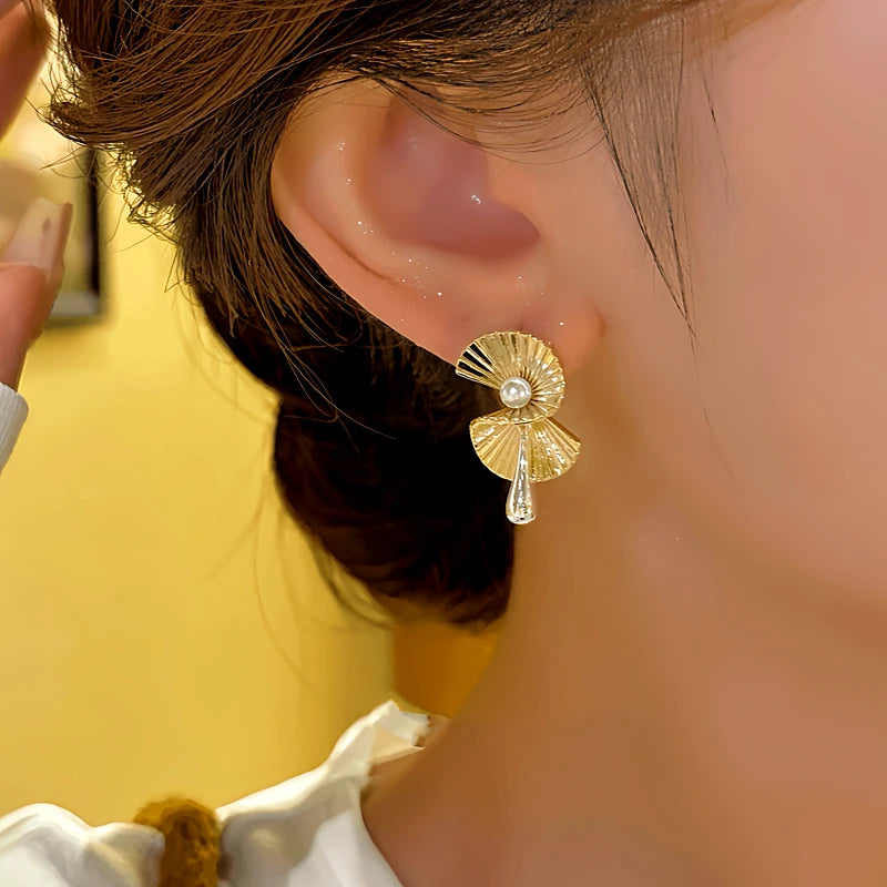 Close-up detail of the sparkling zircons and plating on the Fan-Shaped Beaded Earrings