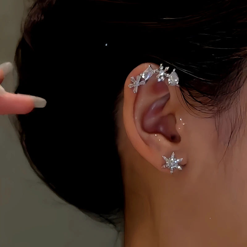 Model showcasing the dangle and style of the 14K Gold-Plated Fashion Zircon Diamond-Studded Smart Snowflake Earrings