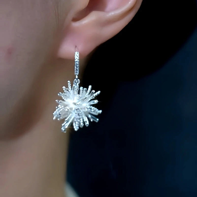 Close-up detail of the sparkling zircons and plating on the Fireworks Earrings