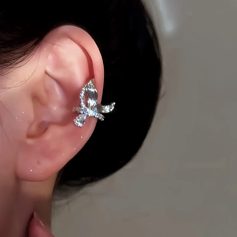 Close-up detail of the sparkling zircons and plating on the Fishtail Ear Bone Clips