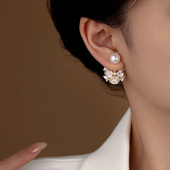 Close-up detail of the sparkling zircons and plating on the Flower Pearl Jacket Earrings