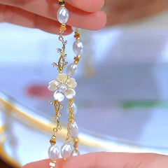 Close-up of the pendant and clasp on the Flower Pearl Necklaces