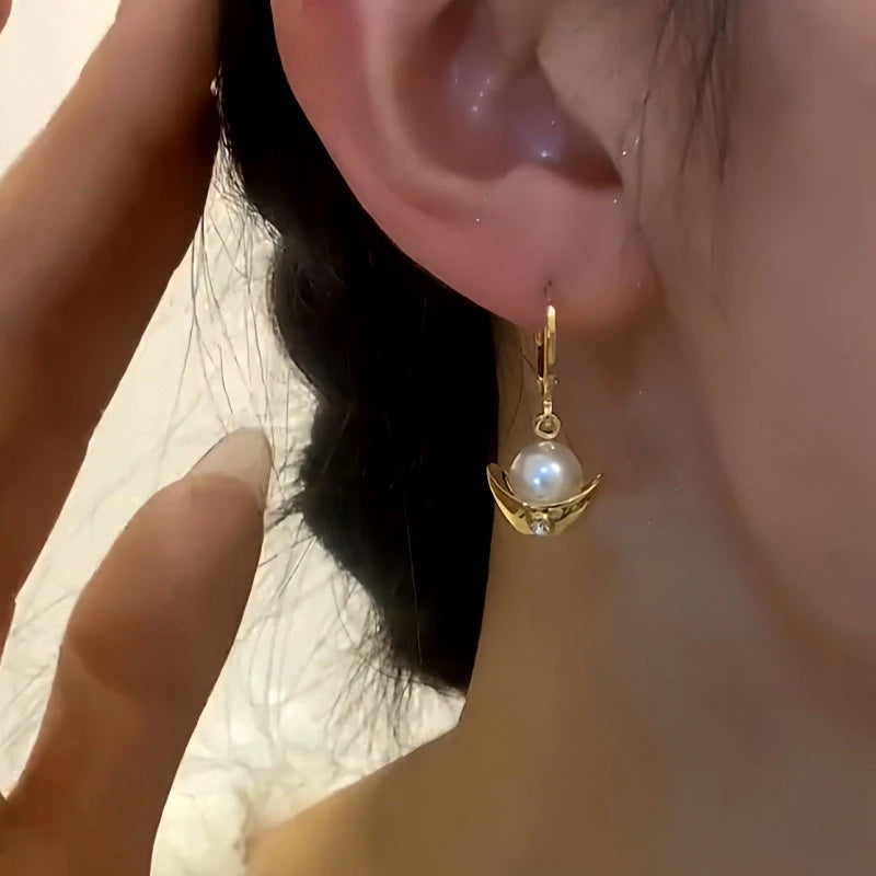 Close-up detail of the sparkling zircons and plating on the Pearl Ingot Earrings
