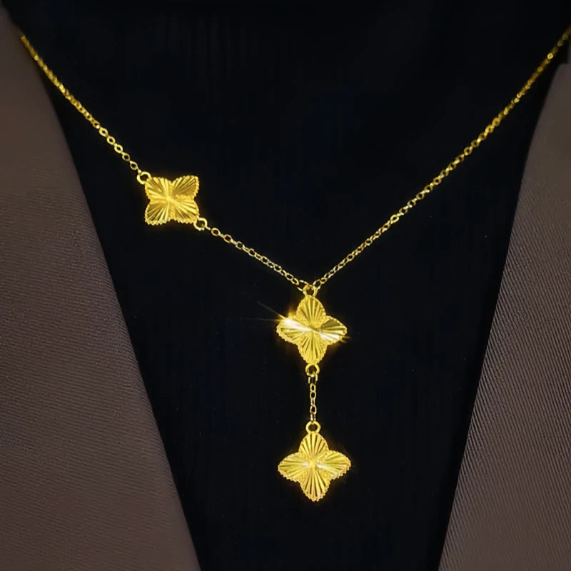 Close-up of the pendant and clasp on the Classic Clover Necklace