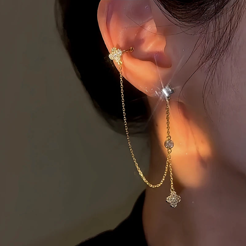 Close-up detail of the sparkling zircons and plating on the Clover Tassel Ear Clip