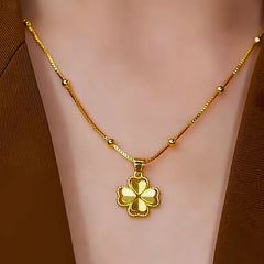 Close-up of the pendant and clasp on the Premium Clover Necklace