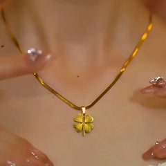Close-up of the pendant and clasp on the Clover Necklace