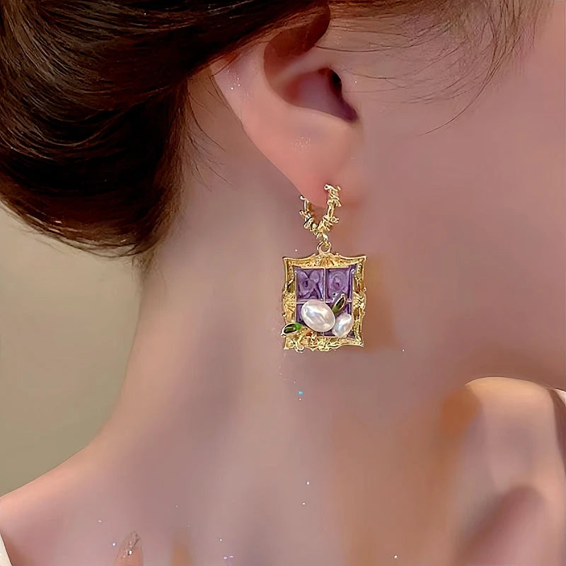 Model showcasing the dangle and style of the 14K Gold-Plated Garden Baroque Natural Pearl Earrings