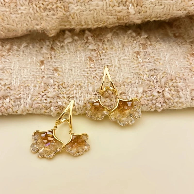 Close-up detail of the sparkling zircons and plating on the Two-Tone Ginkgo Earrings