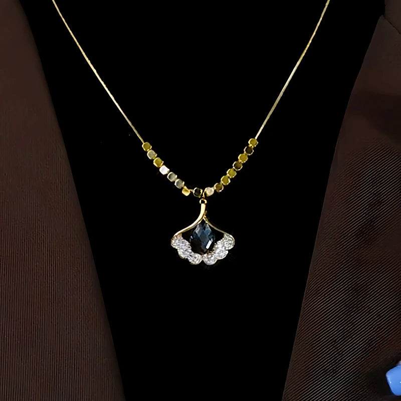 14K Gold-Plated Ginkgo Leaf Necklaces worn to showcase its length and pendant detail