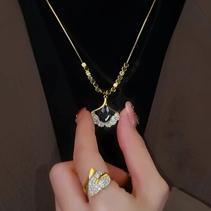 Detailed view of the 14K Gold-Plated Ginkgo Leaf Necklaces chain and pendant