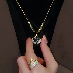 Detailed view of the 14K Gold-Plated Ginkgo Leaf Necklaces chain and pendant