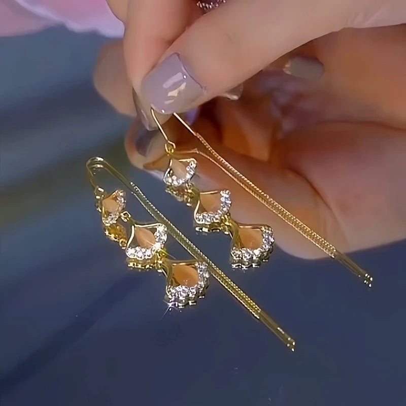 Close-up detail of the sparkling zircons and plating on the Ginkgo Tassel Threaders