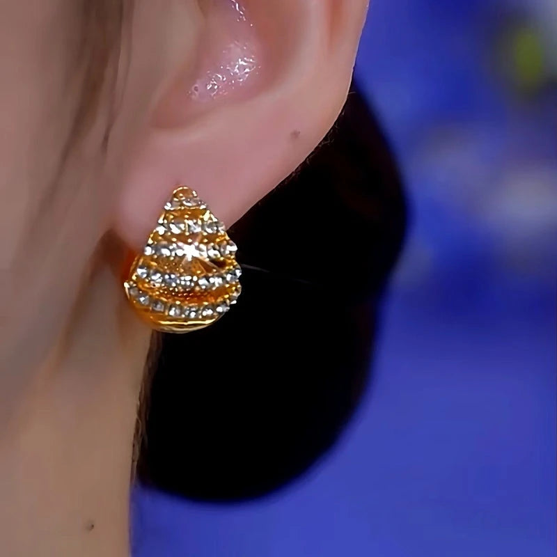 Close-up detail of the sparkling zircons and plating on the Reversible Water Drops