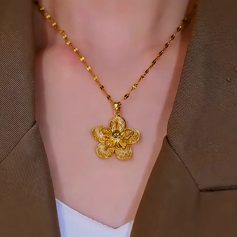 Close-up of the pendant and clasp on the Golden Flower Necklace