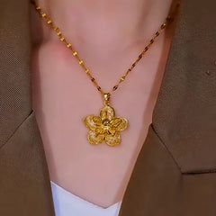 Close-up of the pendant and clasp on the Golden Flower Necklace