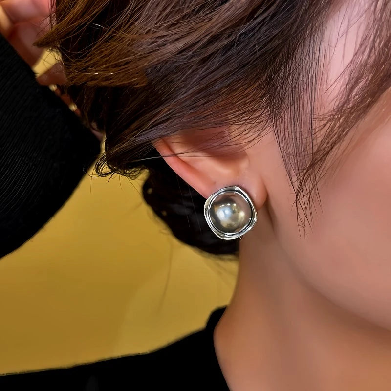 Close-up detail of the sparkling zircons and plating on the Gray Bead Studs