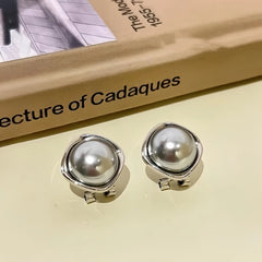 Angled view of the 14K Gold-Plated Gray-Tone Bead Earrings