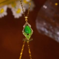 Close-up of the pendant and clasp on the Green Cat's Eye Necklace