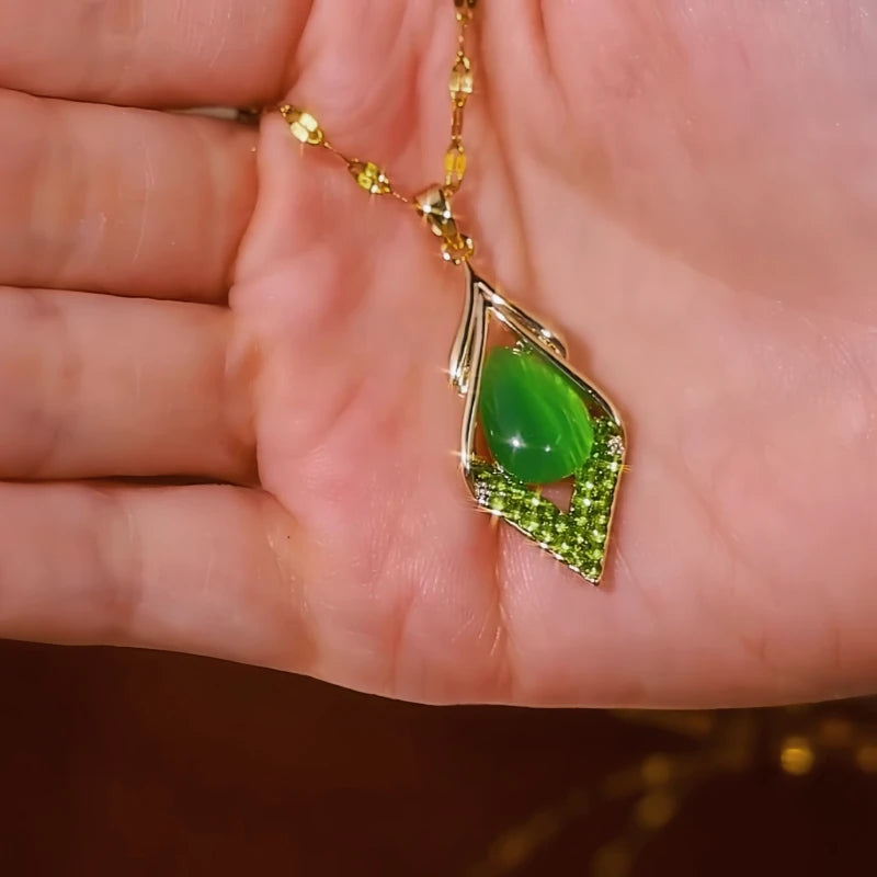 Detailed view of the 14K Gold-Plated Green Cat's Eye Diamond Pendant Necklace chain and pendant