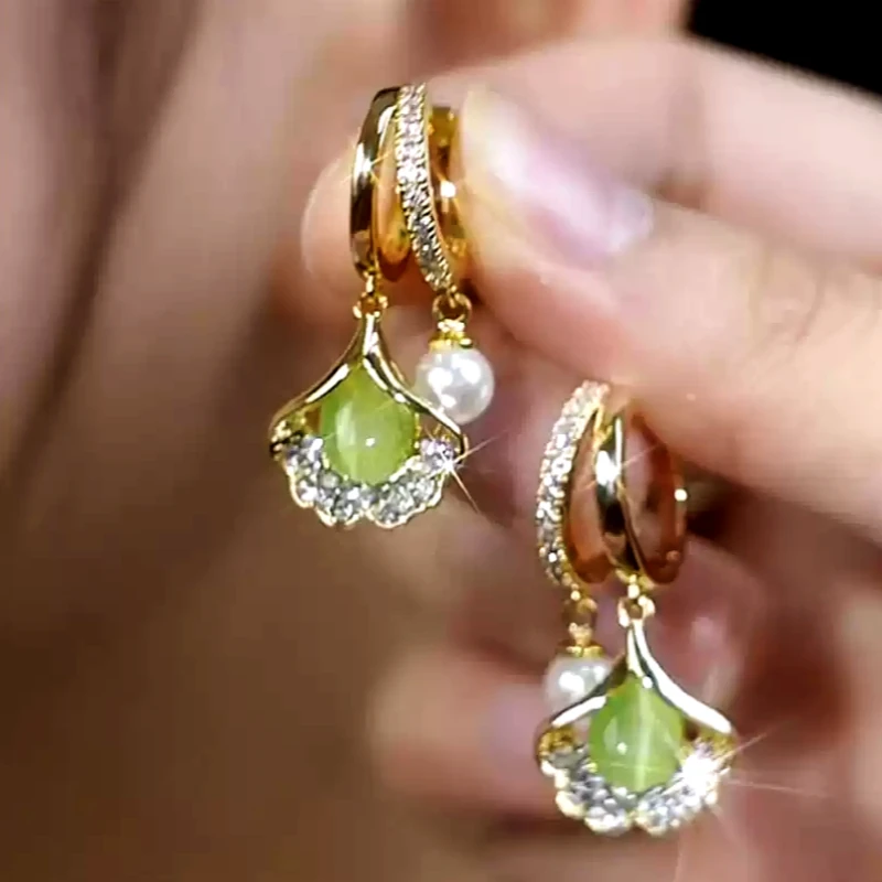 Close-up detail of the sparkling zircons and plating on the Crystal Ginkgo Earrings