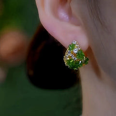 Close-up detail of the sparkling zircons and plating on the Green Crystal Earrings