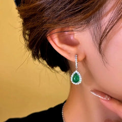 Close-up detail of the sparkling zircons and plating on the Green Water Drop Earrings