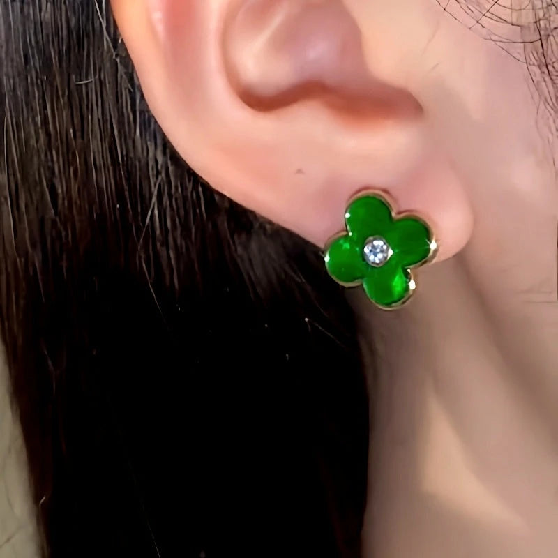 Close-up detail of the sparkling zircons and plating on the Green Clover Studs
