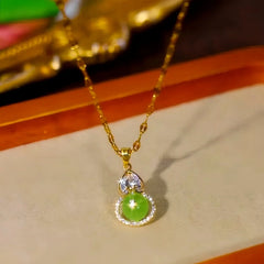 Close-up of the pendant and clasp on the Green Gourd Pendant