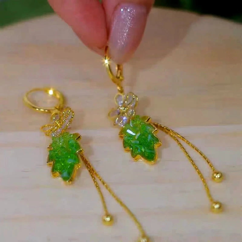 Close-up detail of the sparkling zircons and plating on the Gradient Floral Earrings