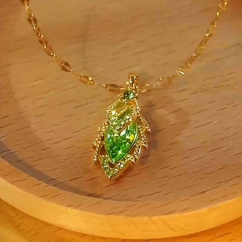 Detailed view of the 14K Gold-Plated Green Zircon Diamond Leaf Necklace chain and pendant