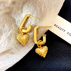 Angled view of the 14K Gold-Plated Heart-Design Pendant Earrings