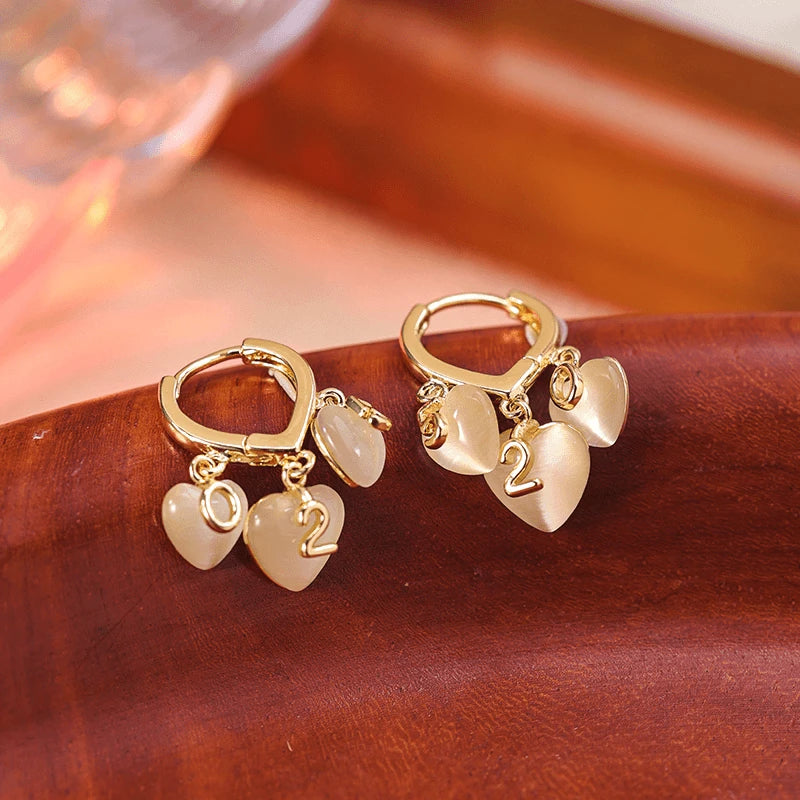 Close-up detail of the sparkling zircons and plating on the Pave Heart Tassel