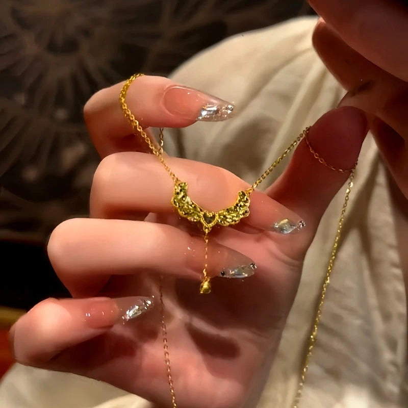 14K Gold-Plated Heart Angel Wing Necklace worn to showcase its length and pendant detail