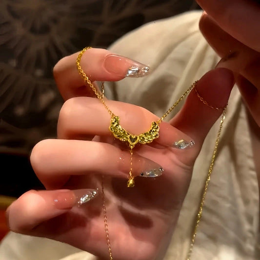 14K Gold-Plated Heart Angel Wing Necklace worn to showcase its length and pendant detail