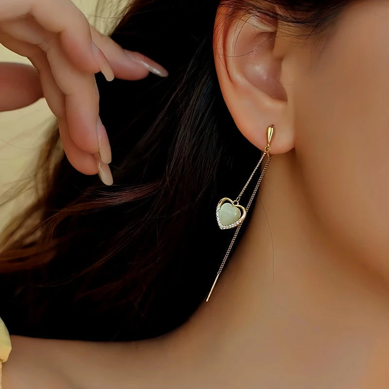 Close-up detail of the sparkling zircons and plating on the Heart Threader Cuff