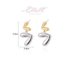 Angled view of the 14K Gold-Plated Heart Earrings