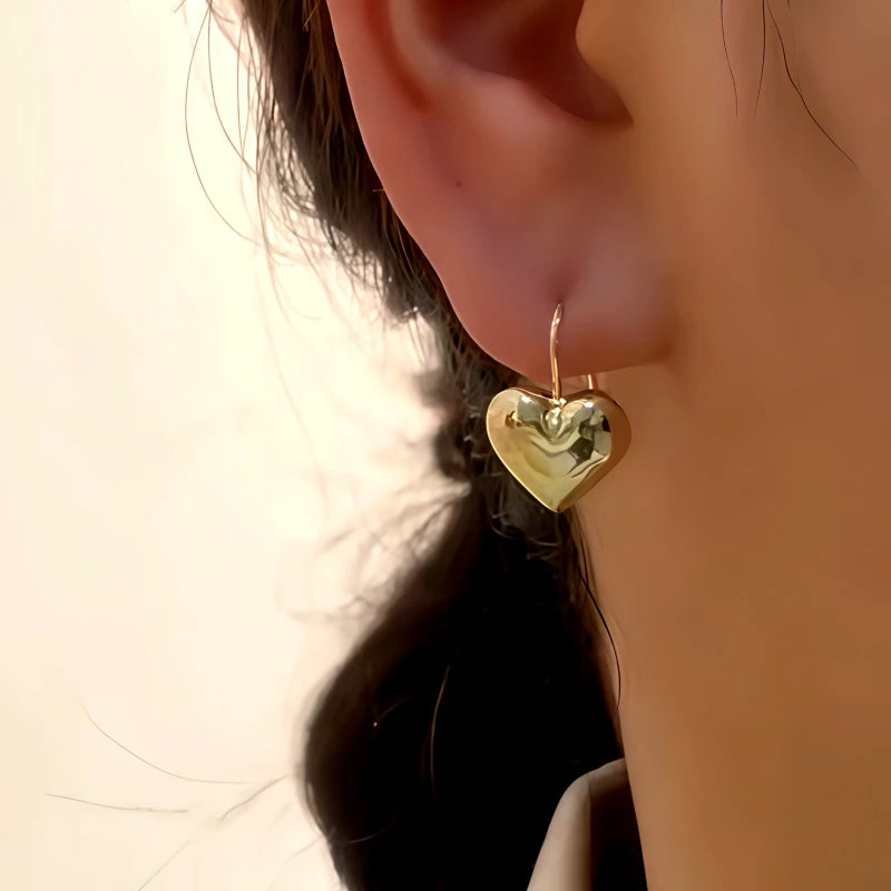 Close-up detail of the sparkling zircons and plating on the Heart Pearl Threaders