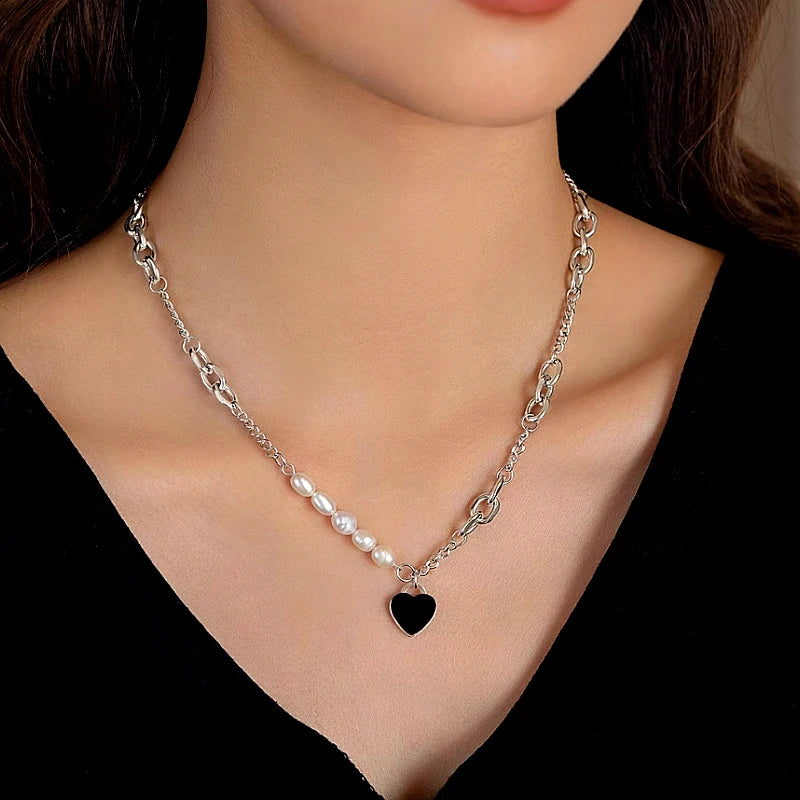 Close-up of the pendant and clasp on the Heart Pearl Necklace