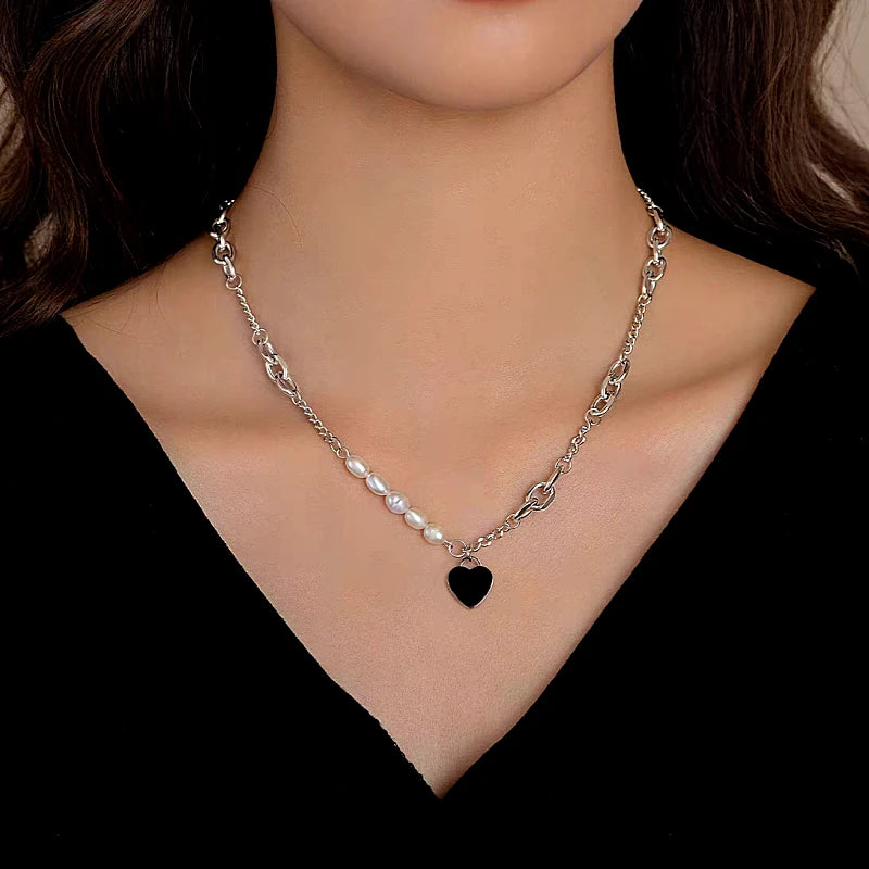 Detailed view of the 14K Gold-Plated Heart Pendant Pearl Necklace chain and pendant